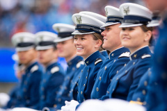 U.S. Air Force Academy, Colo. — Class of 2025 cadets smile during their graduation ceremony at Falcon Stadium in Colorado Springs, Colo., May 29, 2025. Nine hundred nine cadets received their commissions as second lieutenants in the Air Force and Space Force. (U.S. Air Force photo by YOUR NAME HERE)